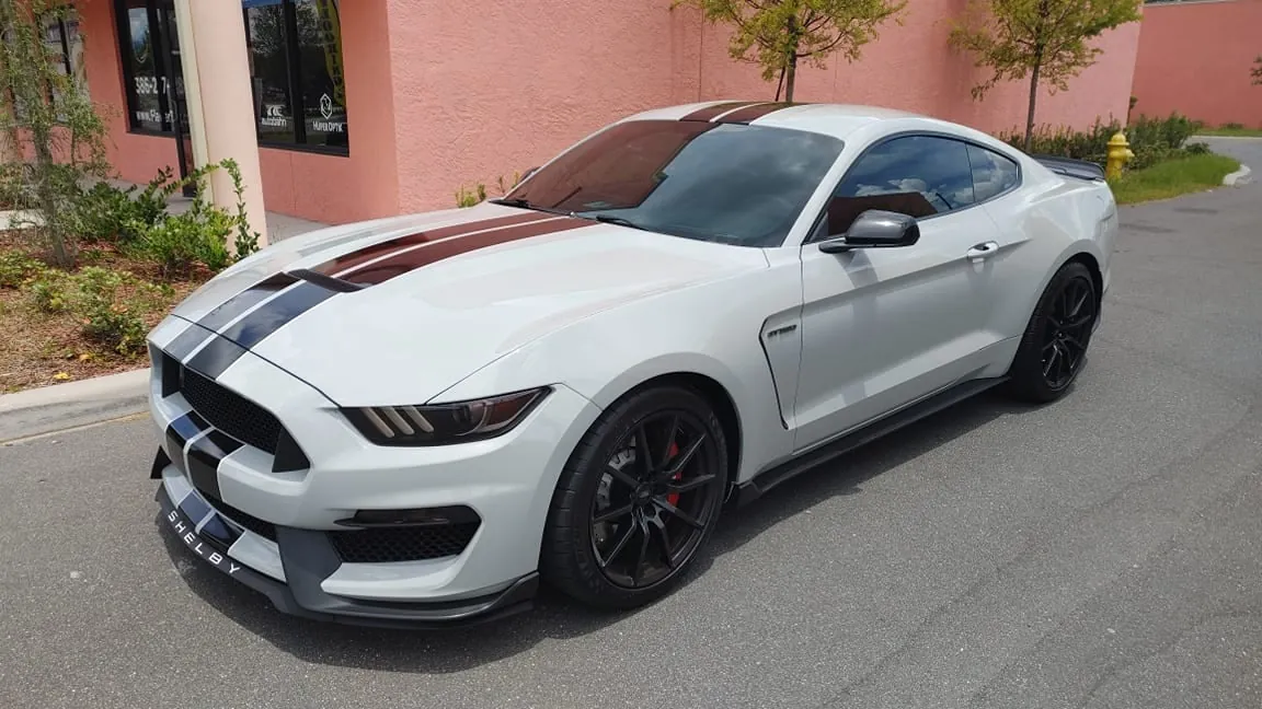 White Shelby GT350 side view
