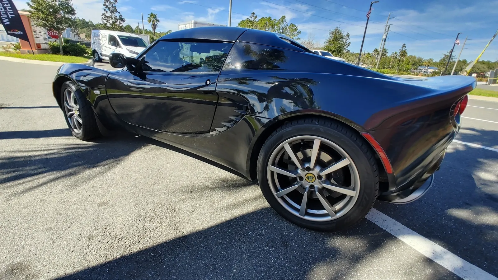 Black Lotus Elise rear three-quarter view